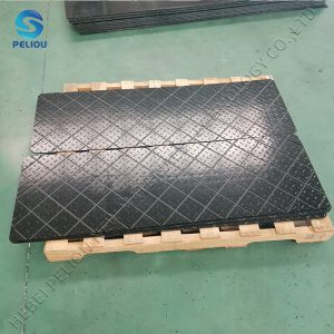 Where are the different patterned surfaces of HDPE road plates applied?